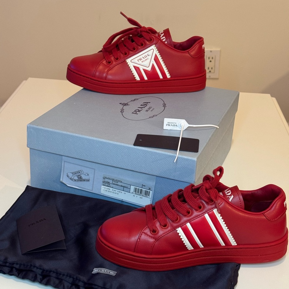 Prada Red Leather Sneakers (Women’s)
Size 36